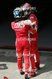 21.10.2007 Sao Paulo, Brazil,  Park Ferme, Felipe Massa (BRA), Scuderia Ferrari and Kimi Raikkonen (FIN), Räikkönen, Scuderia Ferrari - Formula 1 World Championship, Rd 17, Brazilian Grand Prix, Sunday Podium