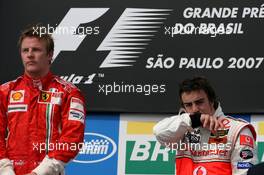 21.10.2007 Sao Paulo, Brazil,  Kimi Raikkonen (FIN), Räikkönen, Scuderia Ferrari, Fernando Alonso (ESP), McLaren Mercedes - Formula 1 World Championship, Rd 17, Brazilian Grand Prix, Sunday Podium