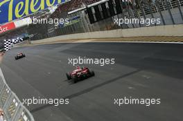 21.10.2007 Sao Paulo, Brazil,  Kimi Raikkonen (FIN), Räikkönen, Scuderia Ferrari and Felipe Massa (BRA), Scuderia Ferrari - Formula 1 World Championship, Rd 17, Brazilian Grand Prix, Sunday Podium