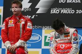 21.10.2007 Sao Paulo, Brazil,  Kimi Raikkonen (FIN), Räikkönen, Scuderia Ferrari and Fernando Alonso (ESP), McLaren Mercedes - Formula 1 World Championship, Rd 17, Brazilian Grand Prix, Sunday Podium