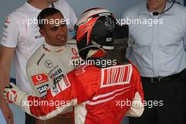 21.10.2007 Sao Paulo, Brazil,  new world champion Kimi Raikkonen (FIN), Räikkönen, Scuderia Ferrari and Lewis Hamilton (GBR), McLaren Mercedes - Formula 1 World Championship, Rd 17, Brazilian Grand Prix, Sunday Podium