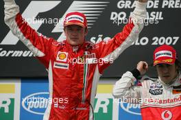 21.10.2007 Sao Paulo, Brazil,  The new world champion Kimi Raikkonen (FIN), Räikkönen, Scuderia Ferrari and Fernando Alonso (ESP), McLaren Mercedes - Formula 1 World Championship, Rd 17, Brazilian Grand Prix, Sunday Podium