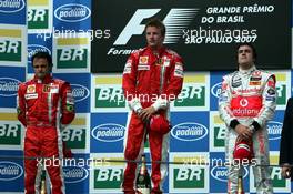 21.10.2007 Sao Paulo, Brazil,  Felipe Massa (BRA), Scuderia Ferrari, Kimi Raikkonen (FIN), Räikkönen, Scuderia Ferrari, Fernando Alonso (ESP), McLaren Mercedes - Formula 1 World Championship, Rd 17, Brazilian Grand Prix, Sunday Podium