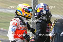 21.10.2007 Sao Paulo, Brazil,  Lewis Hamilton (GBR), McLaren Mercedes with David Coulthard (GBR), Red Bull Racing - Formula 1 World Championship, Rd 17, Brazilian Grand Prix, Sunday Podium