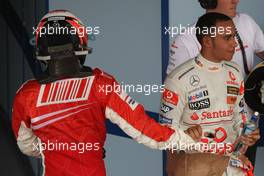 21.10.2007 Sao Paulo, Brazil,  new world champion Kimi Raikkonen (FIN), Räikkönen, Scuderia Ferrari and Lewis Hamilton (GBR), McLaren Mercedes - Formula 1 World Championship, Rd 17, Brazilian Grand Prix, Sunday Podium