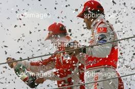 21.10.2007 Sao Paulo, Brazil,  Fernando Alonso (ESP), McLaren Mercedes and Kimi Raikkonen (FIN), Räikkönen, Scuderia Ferrari - Formula 1 World Championship, Rd 17, Brazilian Grand Prix, Sunday Podium