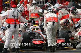 21.10.2007 Sao Paulo, Brazil,  Lewis Hamilton (GBR), McLaren Mercedes, MP4-22 pit stop - Formula 1 World Championship, Rd 17, Brazilian Grand Prix, Sunday Race