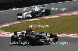 21.10.2007 Sao Paulo, Brazil,  Mark Webber (AUS), Red Bull Racing, RB3 leads Nick Heidfeld (GER), BMW Sauber F1 Team, F1.07 - Formula 1 World Championship, Rd 17, Brazilian Grand Prix, Sunday Race