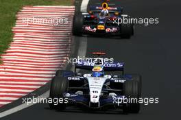 21.10.2007 Sao Paulo, Brazil,  Nico Rosberg (GER), WilliamsF1 Team, David Coulthard (GBR), Red Bull Racing - Formula 1 World Championship, Rd 17, Brazilian Grand Prix, Sunday Race