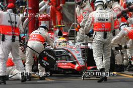 21.10.2007 Sao Paulo, Brazil,  Lewis Hamilton (GBR), McLaren Mercedes, MP4-22 pit stop - Formula 1 World Championship, Rd 17, Brazilian Grand Prix, Sunday Race