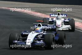 21.10.2007 Sao Paulo, Brazil,  Nico Rosberg (GER), WilliamsF1 Team, Robert Kubica (POL),  BMW Sauber F1 Team - Formula 1 World Championship, Rd 17, Brazilian Grand Prix, Sunday Race