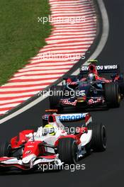 21.10.2007 Sao Paulo, Brazil,  Ralf Schumacher (GER), Toyota Racing, Sebastian Vettel (GER), Scuderia Toro Rosso - Formula 1 World Championship, Rd 17, Brazilian Grand Prix, Sunday Race