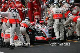 21.10.2007 Sao Paulo, Brazil,  Fernando Alonso (ESP), McLaren Mercedes, MP4-22 pit stop - Formula 1 World Championship, Rd 17, Brazilian Grand Prix, Sunday Race