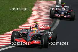 21.10.2007 Sao Paulo, Brazil,  Lewis Hamilton (GBR), McLaren Mercedes, Sebastian Vettel (GER), Scuderia Toro Rosso - Formula 1 World Championship, Rd 17, Brazilian Grand Prix, Sunday Race