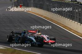 21.10.2007 Sao Paulo, Brazil,  Lewis Hamilton (GBR), McLaren Mercedes, Rubens Barrichello (BRA), Honda Racing F1 Team - Formula 1 World Championship, Rd 17, Brazilian Grand Prix, Sunday Race