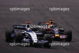 21.10.2007 Sao Paulo, Brazil,  Nico Rosberg (GER), WilliamsF1 Team, David Coulthard (GBR), Red Bull Racing - Formula 1 World Championship, Rd 17, Brazilian Grand Prix, Sunday Race