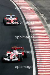 21.10.2007 Sao Paulo, Brazil,  Takuma Sato (JPN), Super Aguri F1, Jarno Trulli (ITA), Toyota Racing - Formula 1 World Championship, Rd 17, Brazilian Grand Prix, Sunday Race