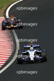 21.10.2007 Sao Paulo, Brazil,  Nico Rosberg (GER), WilliamsF1 Team, David Coulthard (GBR), Red Bull Racing - Formula 1 World Championship, Rd 17, Brazilian Grand Prix, Sunday Race