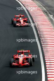 21.10.2007 Sao Paulo, Brazil,  Kimi Raikkonen (FIN), Räikkönen, Scuderia Ferrari, Felipe Massa (BRA), Scuderia Ferrari - Formula 1 World Championship, Rd 17, Brazilian Grand Prix, Sunday Race