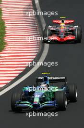 21.10.2007 Sao Paulo, Brazil,  Rubens Barrichello (BRA), Honda Racing F1 Team, Lewis Hamilton (GBR), McLaren Mercedes - Formula 1 World Championship, Rd 17, Brazilian Grand Prix, Sunday Race