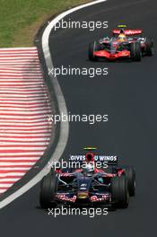 21.10.2007 Sao Paulo, Brazil,  Sebastian Vettel (GER), Scuderia Toro Rosso, Lewis Hamilton (GBR), McLaren Mercedes - Formula 1 World Championship, Rd 17, Brazilian Grand Prix, Sunday Race