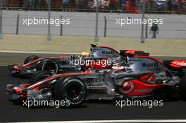 21.10.2007 Sao Paulo, Brazil,  Fernando Alonso (ESP), McLaren Mercedes, MP4-22 and Lewis Hamilton (GBR), McLaren Mercedes, MP4-22 - Formula 1 World Championship, Rd 17, Brazilian Grand Prix, Sunday Race