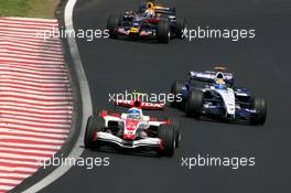 21.10.2007 Sao Paulo, Brazil,  Anthony Davidson (GBR), Super Aguri F1 Team, Nico Rosberg (GER), WilliamsF1 Team - Formula 1 World Championship, Rd 17, Brazilian Grand Prix, Sunday Race