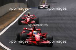 21.10.2007 Sao Paulo, Brazil,  Felipe Massa (BRA), Scuderia Ferrari, Kimi Raikkonen (FIN), Räikkönen, Scuderia Ferrari - Formula 1 World Championship, Rd 17, Brazilian Grand Prix, Sunday Race