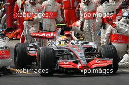 21.10.2007 Sao Paulo, Brazil,  Lewis Hamilton (GBR), McLaren Mercedes, MP4-22 pit stop - Formula 1 World Championship, Rd 17, Brazilian Grand Prix, Sunday Race