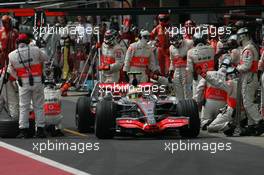 21.10.2007 Sao Paulo, Brazil,  Lewis Hamilton (GBR), McLaren Mercedes, MP4-22 pit stop - Formula 1 World Championship, Rd 17, Brazilian Grand Prix, Sunday Race