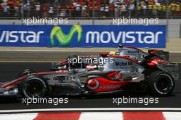 21.10.2007 Sao Paulo, Brazil,  Fernando Alonso (ESP), McLaren Mercedes, MP4-22 and Lewis Hamilton (GBR), McLaren Mercedes, MP4-22 - Formula 1 World Championship, Rd 17, Brazilian Grand Prix, Sunday Race