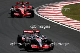 20.10.2007 Sao Paulo, Brazil,  Fernando Alonso (ESP), McLaren Mercedes, Kimi Raikkonen (FIN), Räikkönen, Scuderia Ferrari - Formula 1 World Championship, Rd 17, Brazilian Grand Prix, Saturday Qualifying
