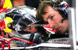 20.10.2007 Sao Paulo, Brazil,  Sebastian Vettel (GER), Test Driver, BMW Sauber F1 Team and John McGill (Scuderia Toro Rosso) - Formula 1 World Championship, Rd 17, Brazilian Grand Prix, Saturday