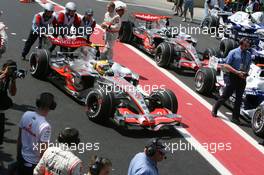 20.10.2007 Sao Paulo, Brazil,  Lewis Hamilton (GBR), McLaren Mercedes, MP4-22 is pushed back to parc ferme - Formula 1 World Championship, Rd 17, Brazilian Grand Prix, Saturday Qualifying