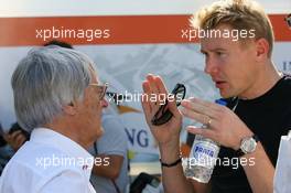 20.10.2007 Sao Paulo, Brazil,  Bernie Ecclestone (GBR) and Mika Hakkinen (FIN), Former Formula One world champion - Formula 1 World Championship, Rd 17, Brazilian Grand Prix, Saturday