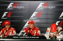 21.10.2007 Sao Paulo, Brazil,  Felipe Massa (BRA), Scuderia Ferrari and Kimi Raikkonen (FIN), Räikkönen, Scuderia Ferrari and Fernando Alonso (ESP), McLaren Mercedes - Formula 1 World Championship, Rd 17, Brazilian Grand Prix, Sunday Press Conference