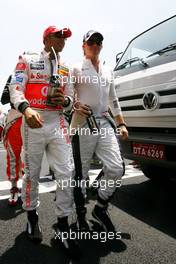 21.10.2007 Sao Paulo, Brazil,  Robert Kubica (POL),  BMW Sauber F1 Team , Nico Rosberg (GER), WilliamsF1 Team - Formula 1 World Championship, Rd 17, Brazilian Grand Prix, Sunday