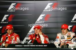 21.10.2007 Sao Paulo, Brazil,  Felipe Massa (BRA), Scuderia Ferrari, Kimi Raikkonen (FIN), Räikkönen, Scuderia Ferrari and Fernando Alonso (ESP), McLaren Mercedes - Formula 1 World Championship, Rd 17, Brazilian Grand Prix, Sunday Press Conference