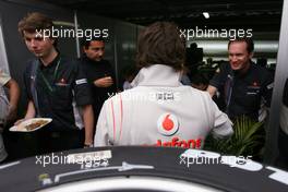 18.10.2007 Sao Paulo, Brazil,  Fernando Alonso (ESP), McLaren Mercedes talking with RedBull Racing people - Formula 1 World Championship, Rd 17, Brazilian Grand Prix, Thursday