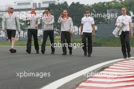 18.10.2007 Sao Paulo, Brazil,  Lewis Hamilton (GBR), McLaren Mercedes on a trackwalk with his team - Formula 1 World Championship, Rd 17, Brazilian Grand Prix, Thursday
