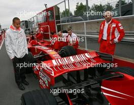 08.06.2007 Montreal, Canada,  Lewis Hamilton (GBR), McLaren Mercedes, looks at the Scuderia Ferrari F2007 - Formula 1 World Championship, Rd 6, Canadian Grand Prix, Friday