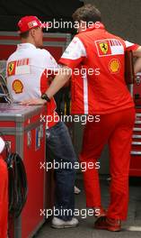 08.06.2007 Montreal, Canada,  Michael Schumacher (GER), Scuderia Ferrari, Advisor and Chris Dyer (AUS), Scuderia Ferrari, Track Engineer of Kimi Raikkonen (FIN) - Formula 1 World Championship, Rd 6, Canadian Grand Prix, Friday