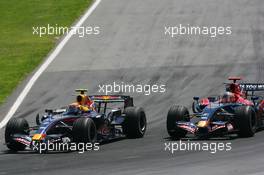 10.06.2007 Montreal, Canada,  Mark Webber (AUS), Red Bull Racing, RB3 and Vitantonio Liuzzi (ITA), Scuderia Toro Rosso, STR02 - Formula 1 World Championship, Rd 6, Canadian Grand Prix, Sunday Race