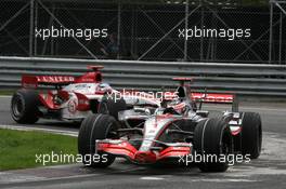 10.06.2007 Montreal, Canada,  Fernando Alonso (ESP), McLaren Mercedes, Takuma Sato (JPN), Super Aguri F1 - Formula 1 World Championship, Rd 6, Canadian Grand Prix, Sunday Race