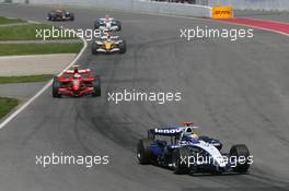 10.06.2007 Montreal, Canada,  Nico Rosberg (GER), WilliamsF1 Team, FW29 and Kimi Raikkonen (FIN), Räikkönen, Scuderia Ferrari, F2007 - Formula 1 World Championship, Rd 6, Canadian Grand Prix, Sunday Race