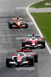10.06.2007 Montreal, Canada,  Anthony Davidson (GBR), Super Aguri F1 Team, SA07 and Ralf Schumacher (GER), Toyota Racing, TF107 - Formula 1 World Championship, Rd 6, Canadian Grand Prix, Sunday Race