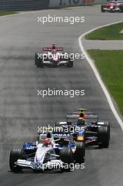 10.06.2007 Montreal, Canada, Robert Kubica (POL), BMW Sauber F1 Team, F1.07 and Mark Webber (AUS), Red Bull Racing, RB3 - Formula 1 World Championship, Rd 6, Canadian Grand Prix, Sunday Race