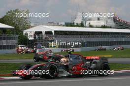 10.06.2007 Montreal, Canada, Lewis Hamilton (GBR), McLaren Mercedes, MP4-22 and Fernando Alonso (ESP), McLaren Mercedes, MP4-22 - Formula 1 World Championship, Rd 6, Canadian Grand Prix, Sunday Race