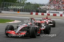 10.06.2007 Montreal, Canada,  Fernando Alonso (ESP), McLaren Mercedes, Takuma Sato (JPN), Super Aguri F1 - Formula 1 World Championship, Rd 6, Canadian Grand Prix, Sunday Race