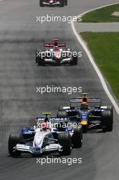 10.06.2007 Montreal, Canada,  Robert Kubica (POL), BMW Sauber F1 Team, F1.07, Mark Webber (AUS), Red Bull Racing, RB3 - Formula 1 World Championship, Rd 6, Canadian Grand Prix, Sunday Race